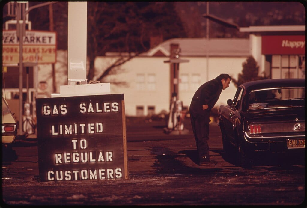 During the fuel crisis before gasoline sales were regulated by the state a dealer in Tigard, pumped gas only to his regular customers. The driver in this picture was refused service (1974)