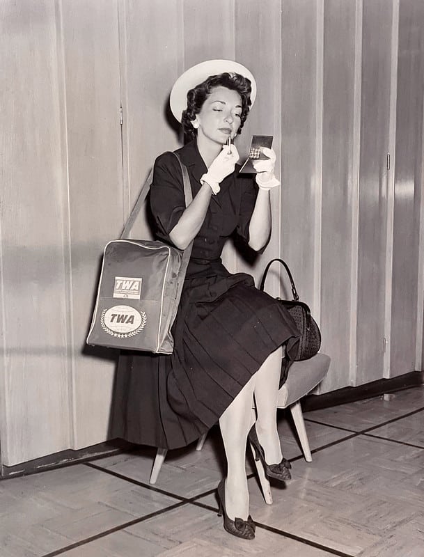 1960s Pretty Brunette Modeling TWA Flight Bag
