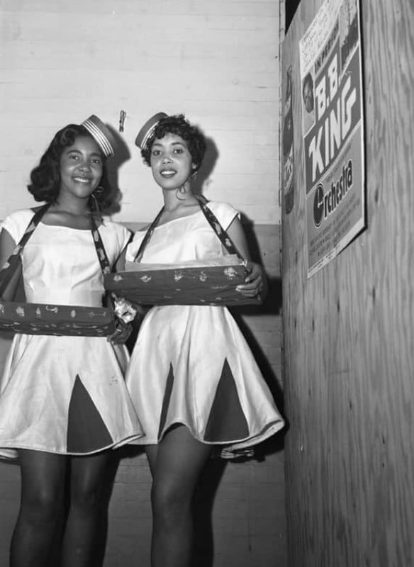 Ebony cigarette girls working at a Florida club