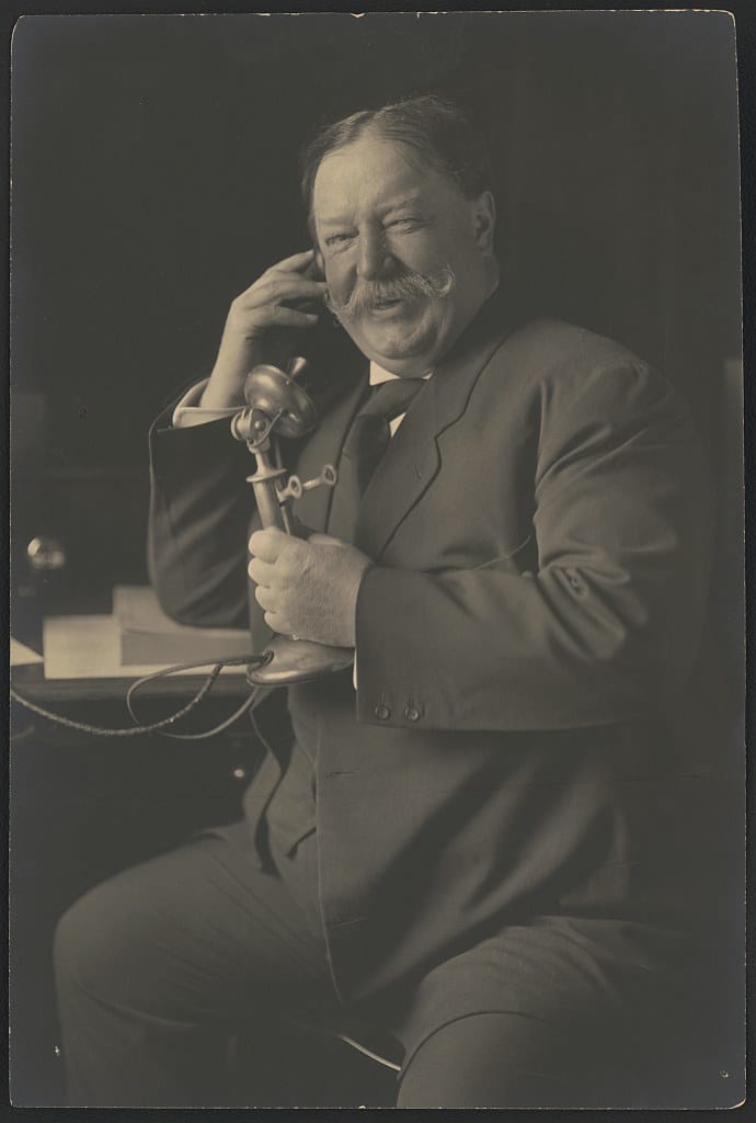 William Howard Taft, talking on a telephone as he receives nomination news