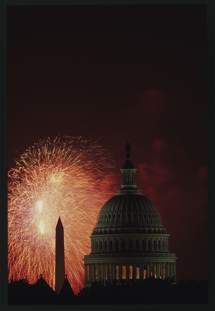 Fireworks lighting up the night sky near the U.S. Capitol and Washington Monument, Washington, D.C. (4 July 1995)