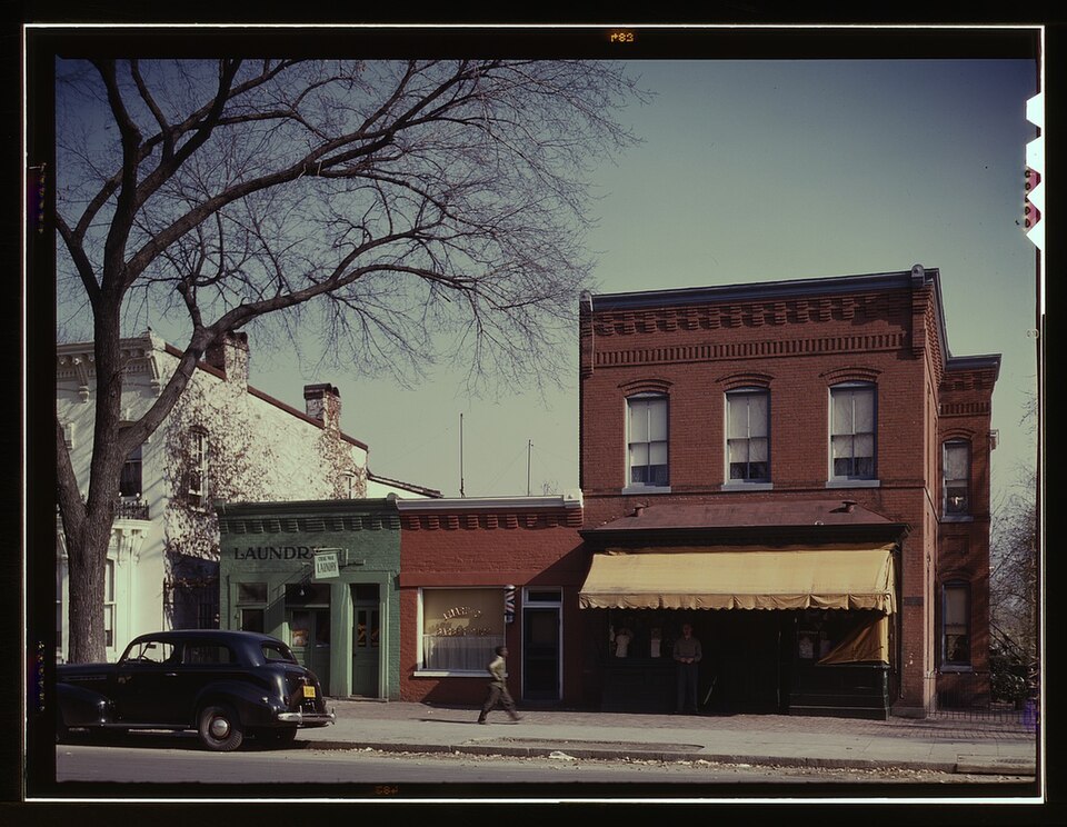 1941 Photo shows a 1939 Chevrolet in front of a laundry