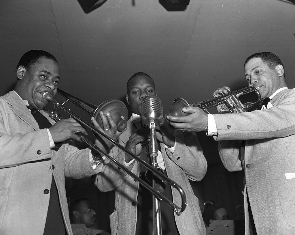 New York, New York. A trio of musicians from Duke Ellington's orchestra during the early morning broadcast (1943 Apr.)