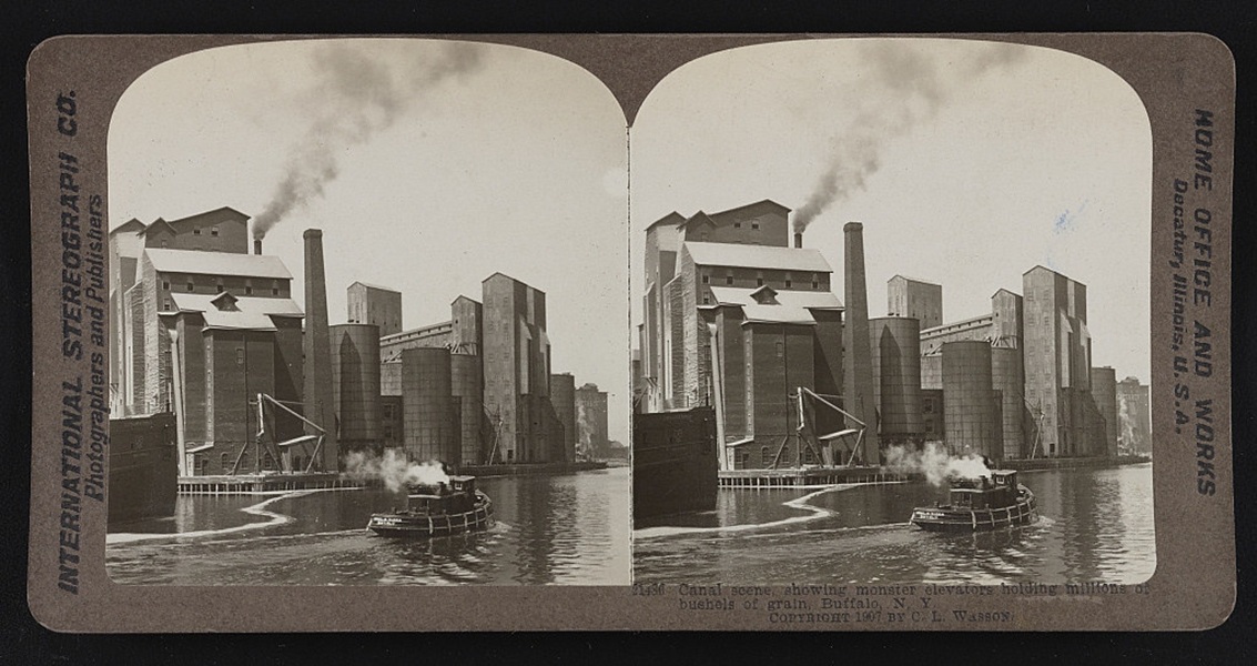 Canal scene, showing monster elevators holding millions of bushels of grain, Buffalo, N. Y. (1907)