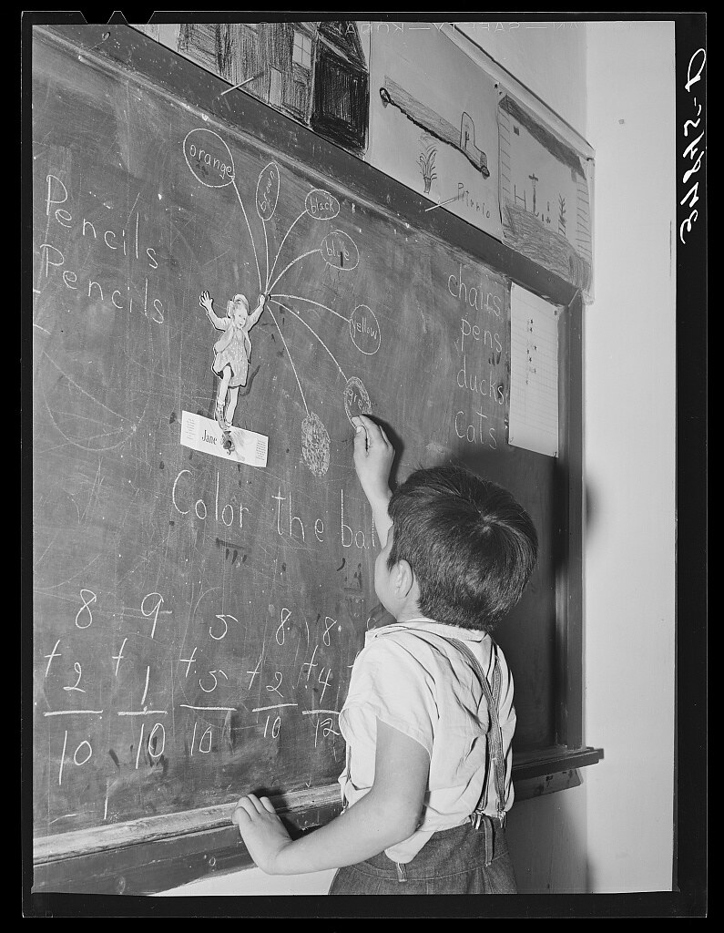 Grade school pupil at blackboard. Concho, Arizona (1940 Oct.)