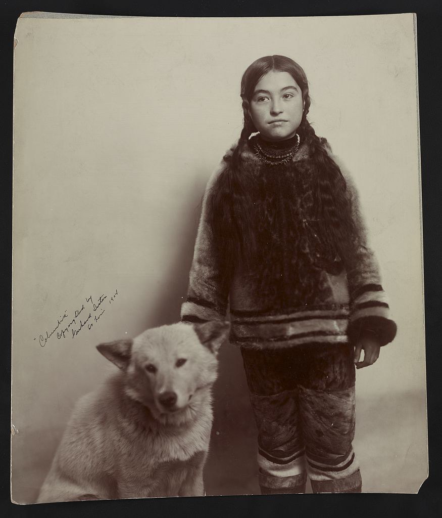 Columbia—Inuit girl Nancy Columbia and dog, Louisiana Purchase Exposition, Missouri, 1904.