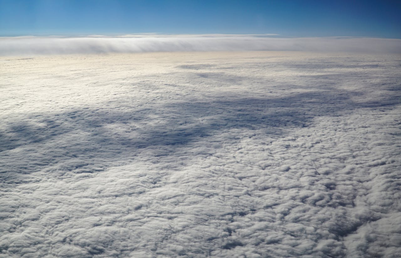 View above dense clouds.