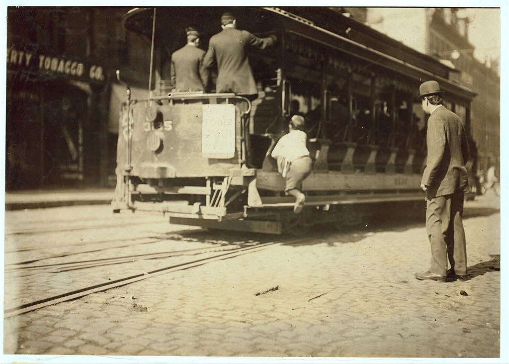 Boston newsboy flipping cars