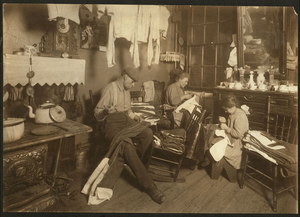 Jennie Rizzandi helping sew garments, NYC