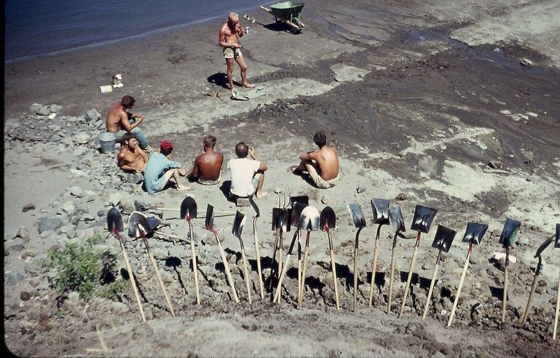 Archaeologists resting on Oregon beach, 1966