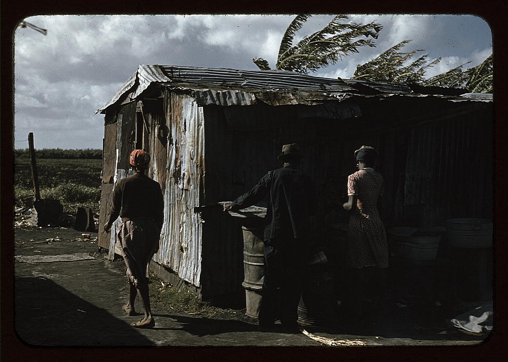 Black migratory workers and one shack, Belle Glade, Fla. (1941 Feb.)