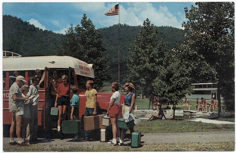 Schoolkids boarding camp bus in North Carolina, 1950s