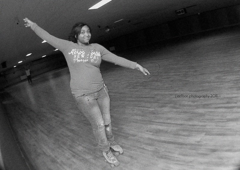 An amateur roller skater named Jessica roller skating