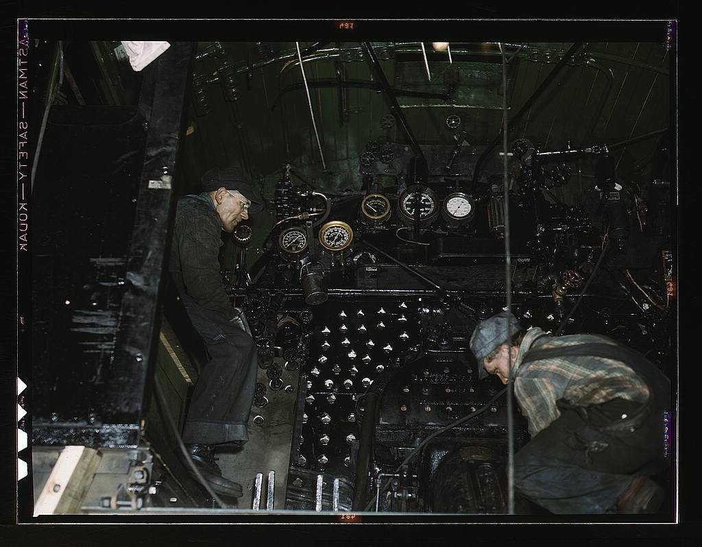 Working on the cab of a locomotive brought in for repair at the C & NW RR 40th Street shops, Chicago, Ill. (1942 Dec.)