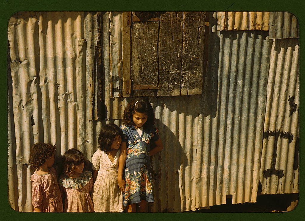 Children in a company housing settlement, Puerto Rico (1941 Dec.)