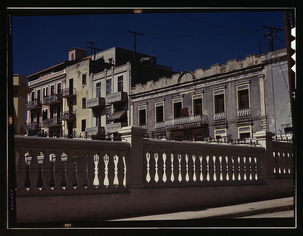 Apartment houses near the cathedral in the old part of the city, San Juan (1941 Dec.)