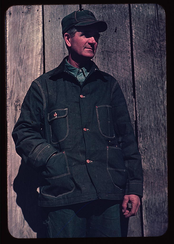 Man in bill cap and dungaree coat, possibly a farmer (between 1941 and 1942)