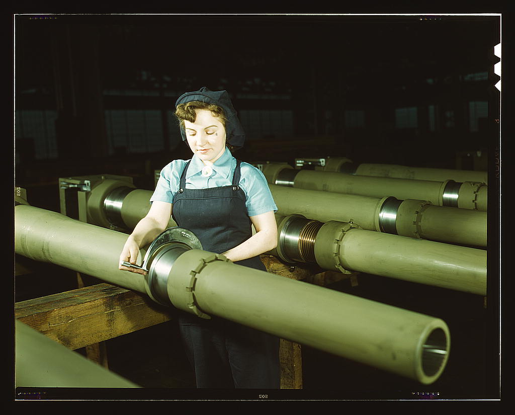Mary Betchner inspects artillery cutters, Milwaukee