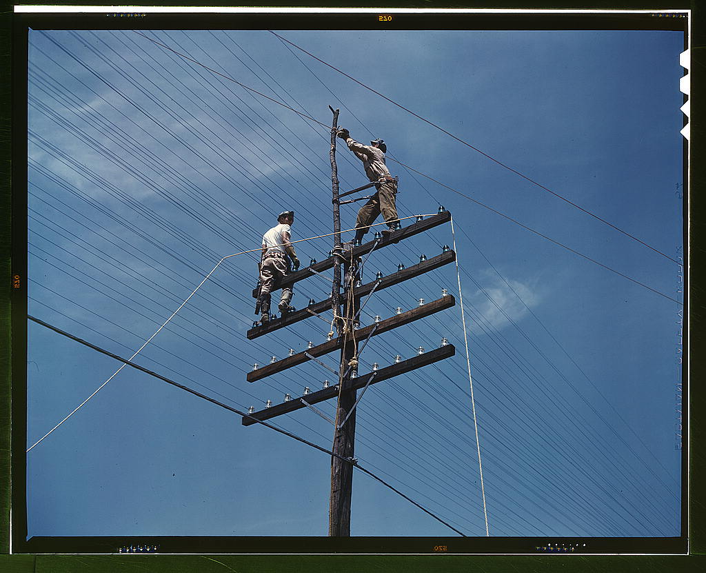 Men working power lines, TVA project