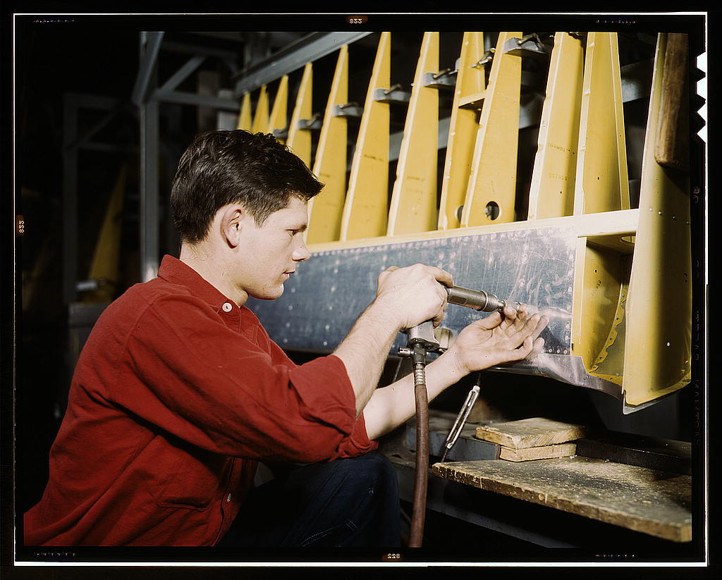 Riveter at Douglas Aircraft plant 1942