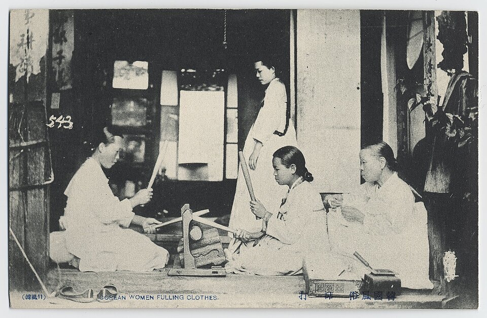 Women fulling clothes with pangmangi, Korea, c. 1904