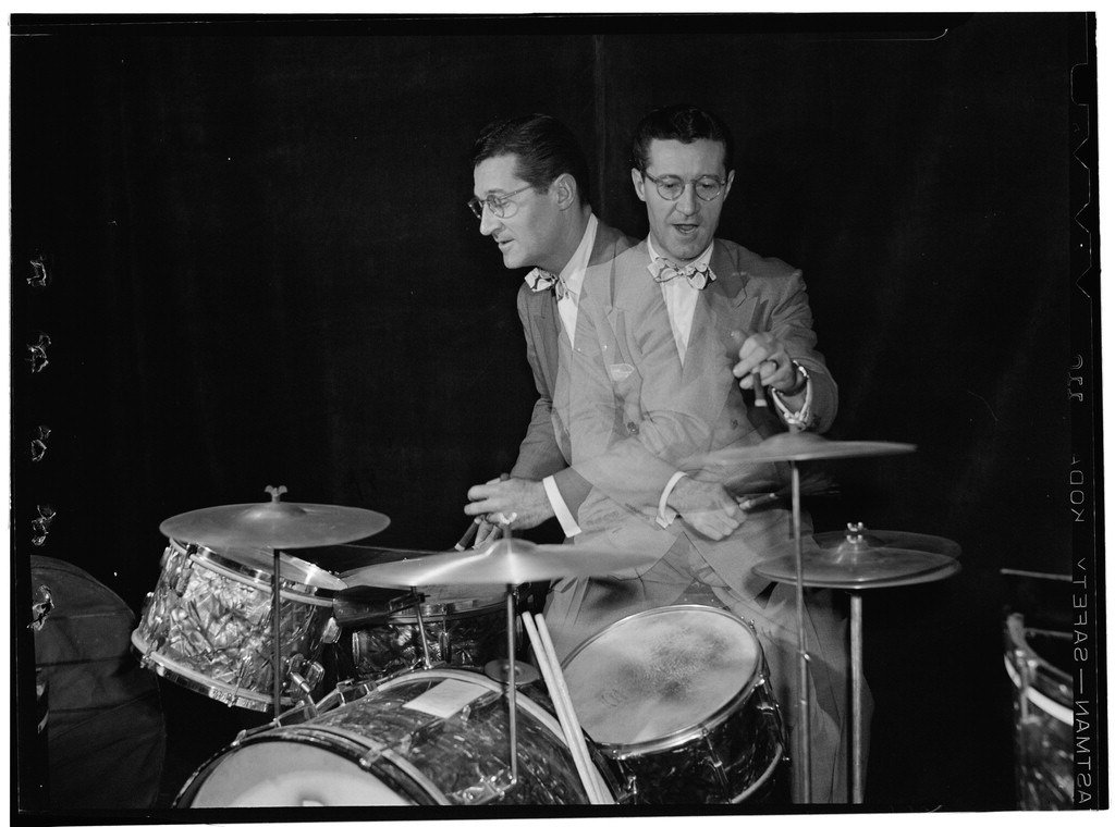 Ray McKinley at the drums, reflected and animated, Hotel Commodore, 1946