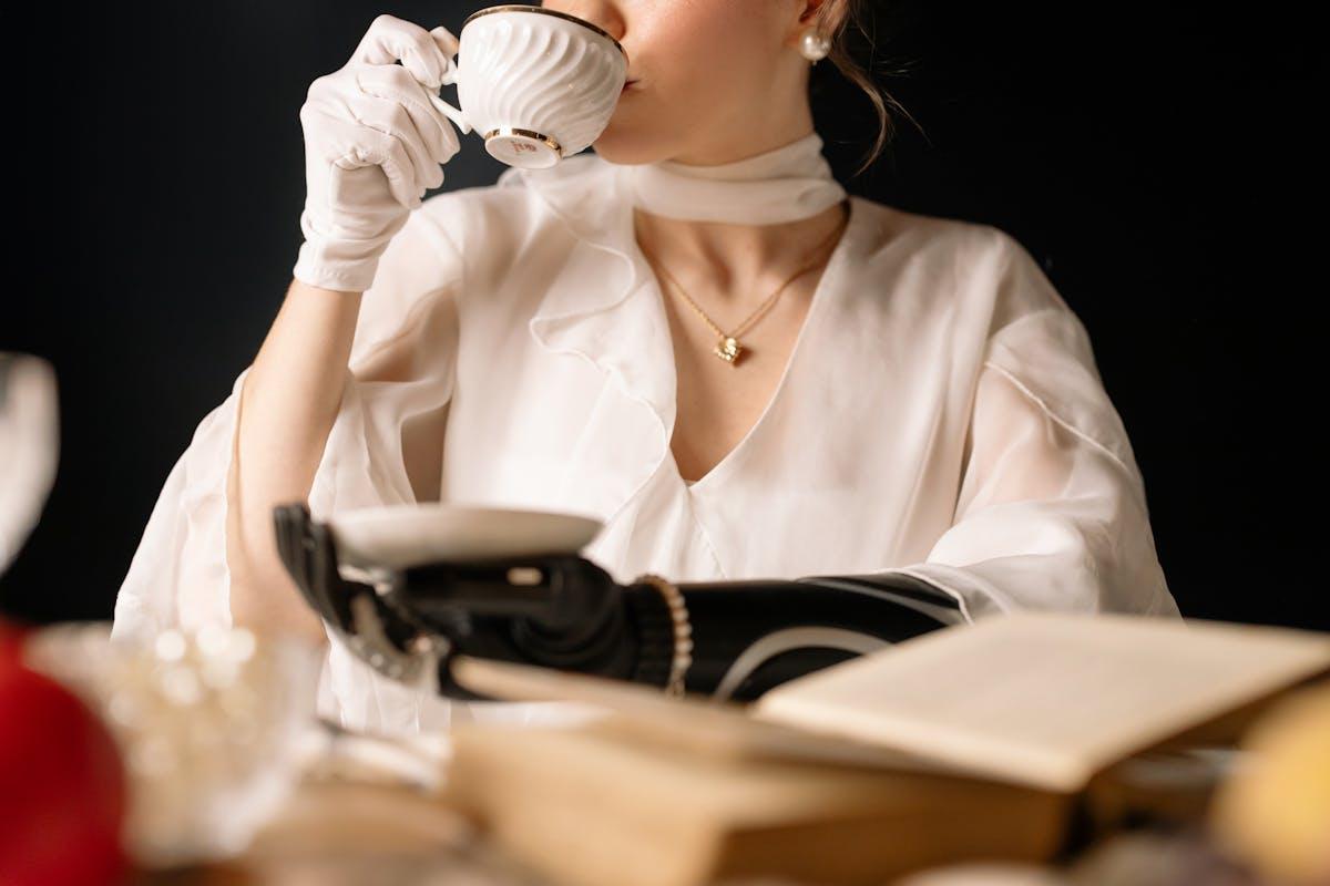 A person drinking from a tea cup AI-generated content may be incorrect.